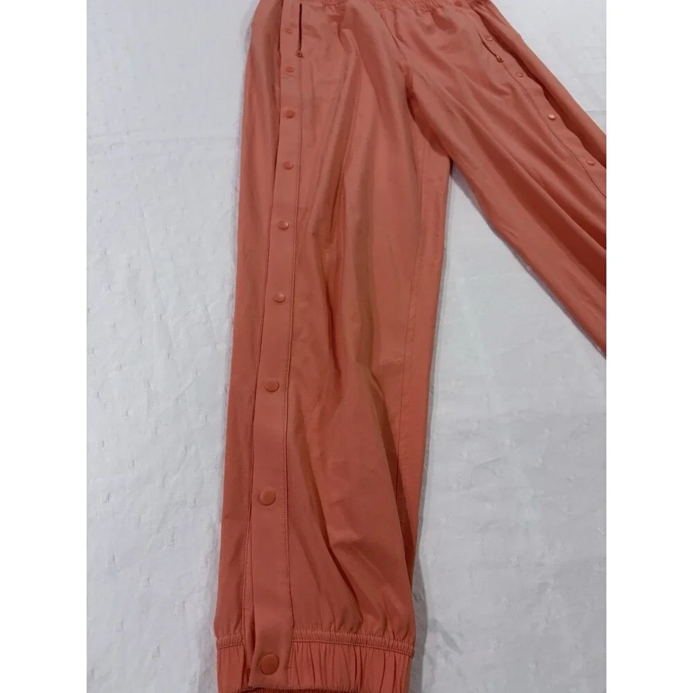 Lululemon Tear-Away Mid-Rise Track Pant Size 6 Coral Kiss Orange Swift LW5GAXS